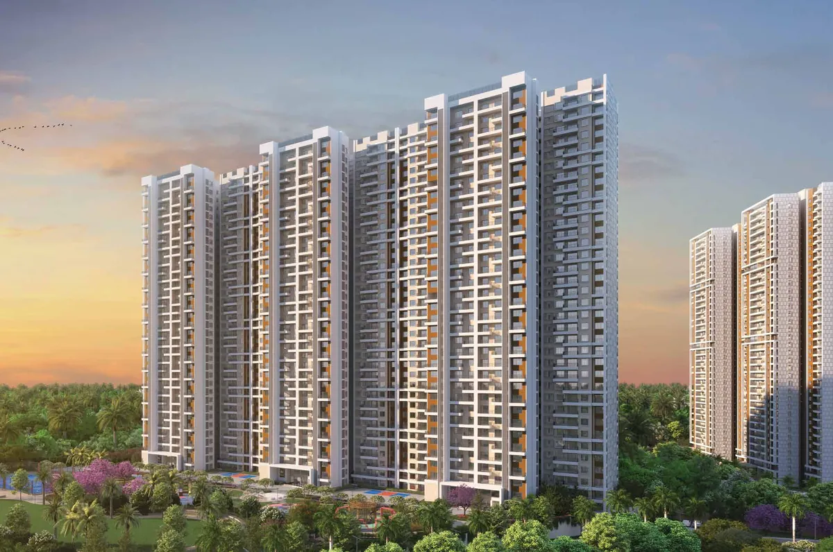 Mana Skanda The Right Life high-rise towers at sunset Mana Skanda The Right Life high-rise towers at sunset